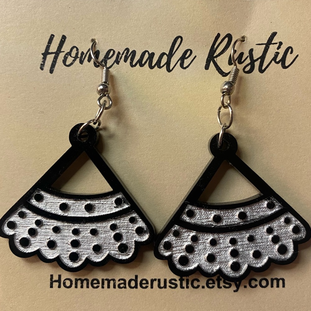 Wooden Ruth Bader Ginsburg inspired earrings.